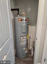 209 3rd Street Crumpton, MD 21628 - Photo 41 of 108 a water heater sitting next to a window