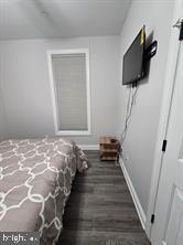 209 3rd Street Crumpton, MD 21628 - Photo 45 of 108 a bedroom with bed and flat screen tv