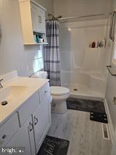209 3rd Street Crumpton, MD 21628 - Photo 69 of 108 a bathroom with a sink a toilet and shower