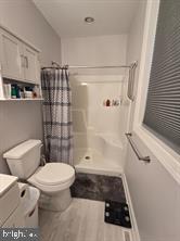 209 3rd Street Crumpton, MD 21628 - Photo 73 of 108 a bathroom with a toilet and shower