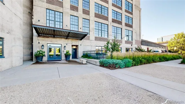 a view of a building with a garden
