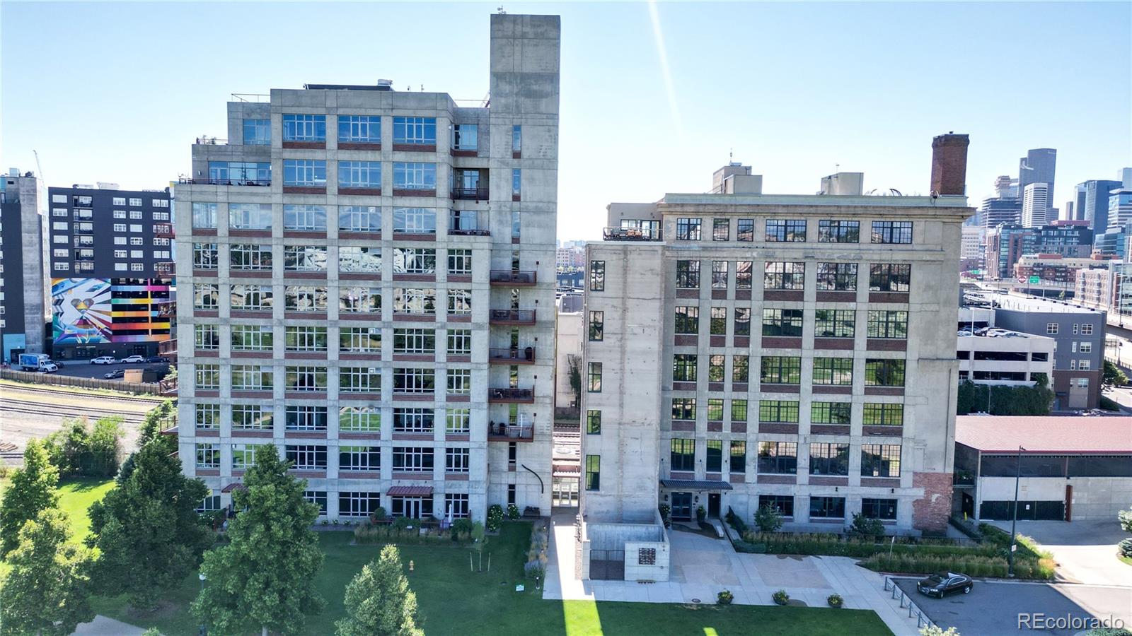 2000 Little Raven Street, Unit 702 Denver, CO 80202 - Photo 43 of 48 front view of a building with a lot of windows