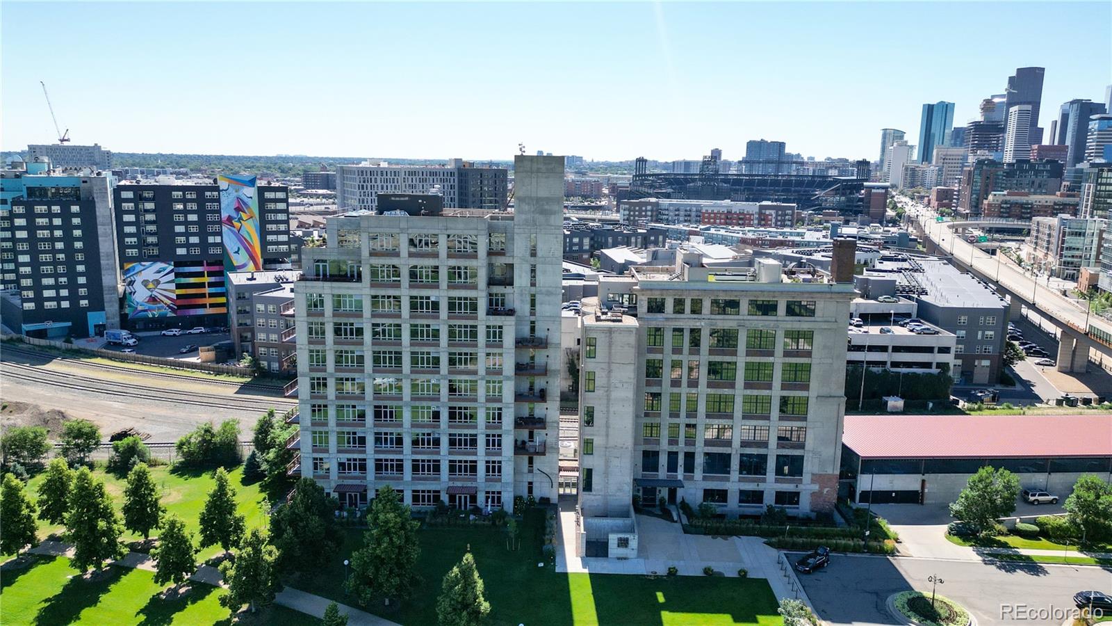 2000 Little Raven Street, Unit 702 Denver, CO 80202 - Photo 44 of 48 a view of a city that has tall buildings and a big yard