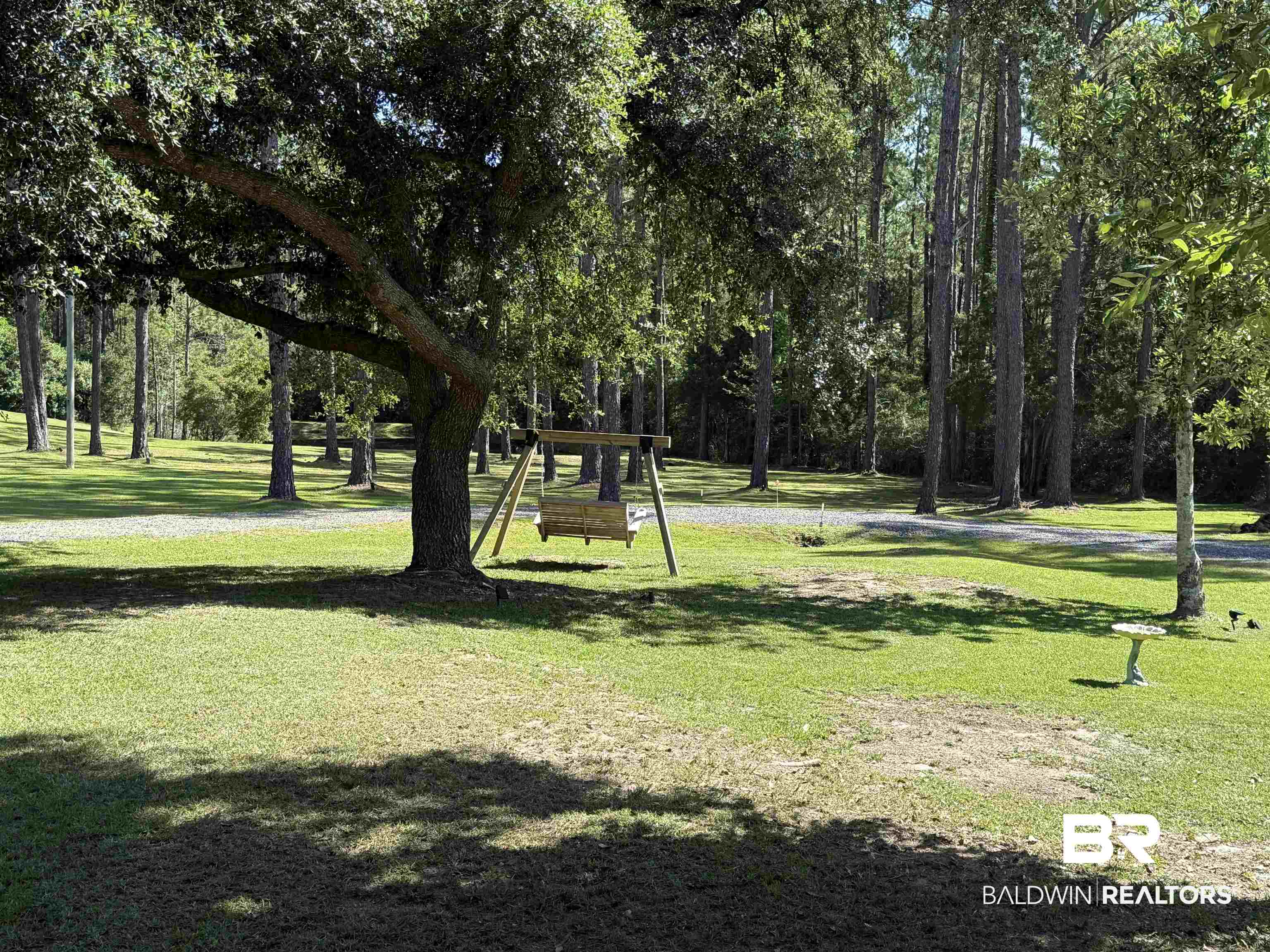 14601 Trawick Road Stapleton, AL 36578 - Photo 34 of 37 View of community with a yard