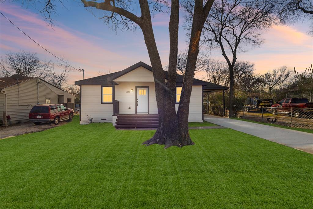 4325 Highland Street Lancaster, TX 75134 - Photo 2 of 35 a house view with a garden space