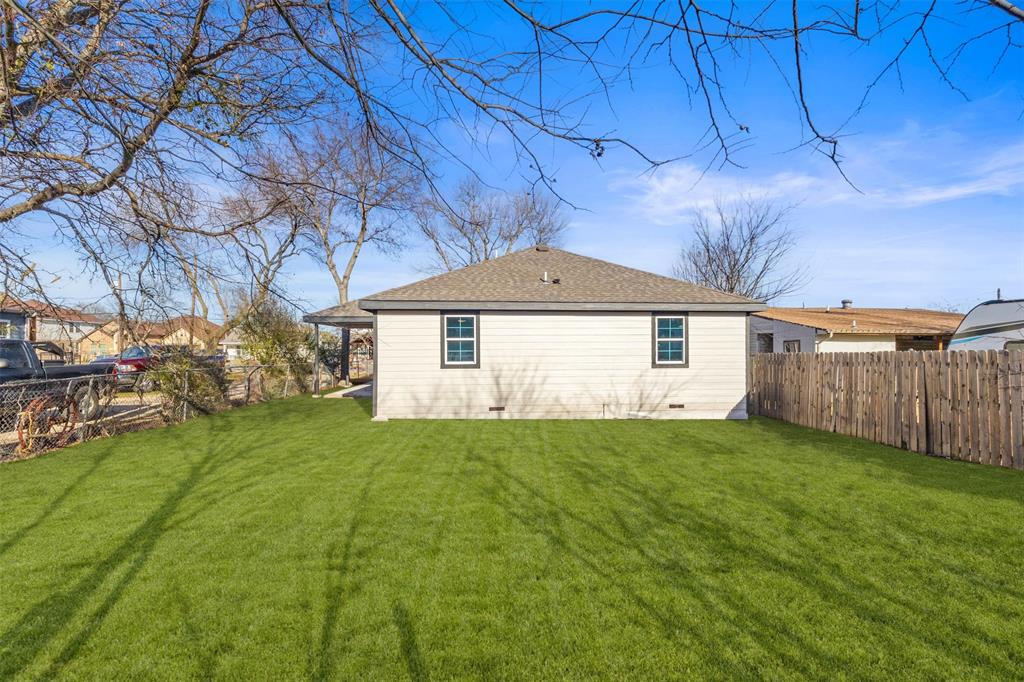 4325 Highland Street Lancaster, TX 75134 - Photo 29 of 35 a view of a house with a yard