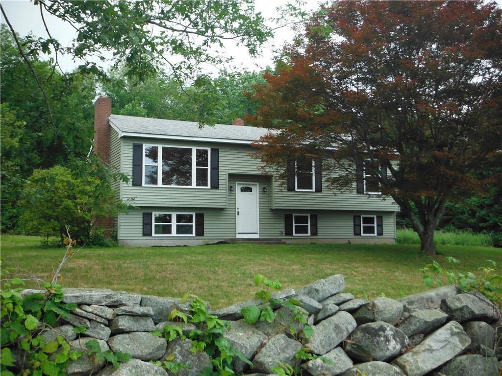 470 Goshen Hill Road Lebanon, CT 06249 - Photo 1 of 1 a front view of a house with garden