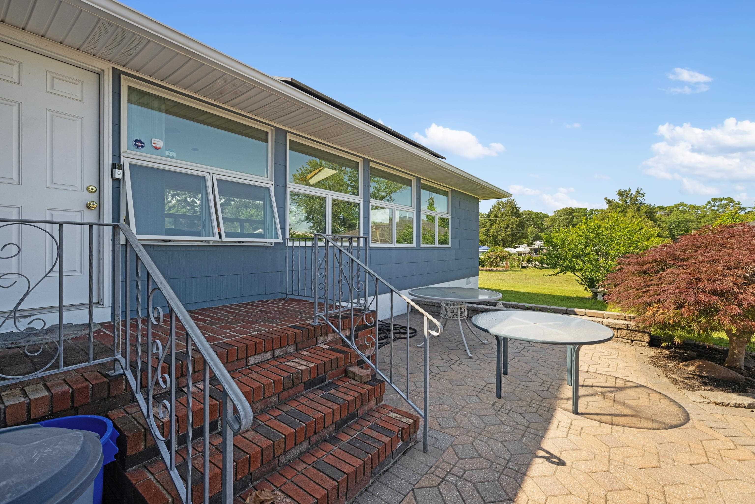 102 Teal Road Rio Grande, NJ 08242 - Photo 13 of 49 a view of a house with backyard and sitting area
