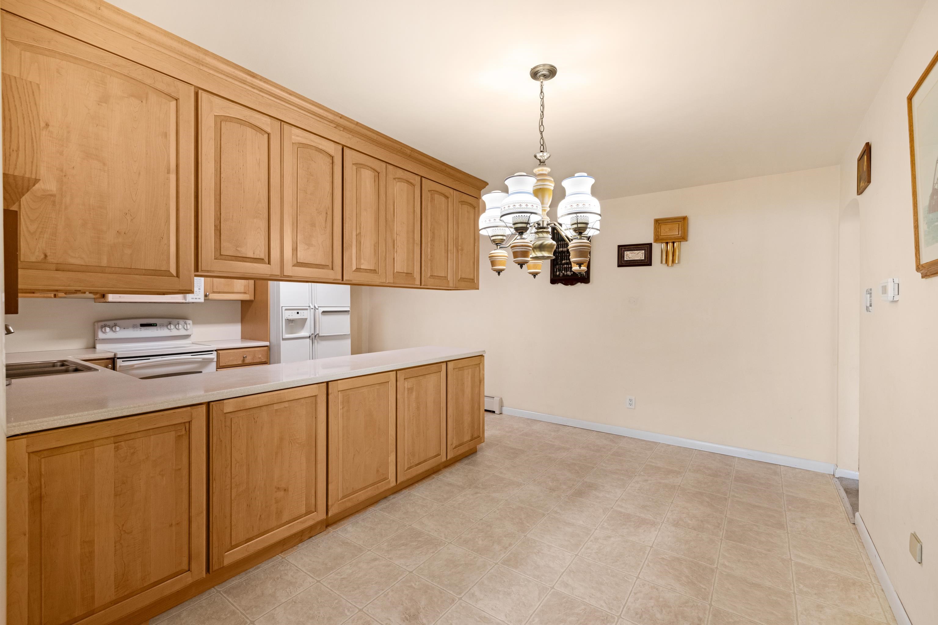 102 Teal Road Rio Grande, NJ 08242 - Photo 20 of 49 a kitchen with appliances cabinets and a sink