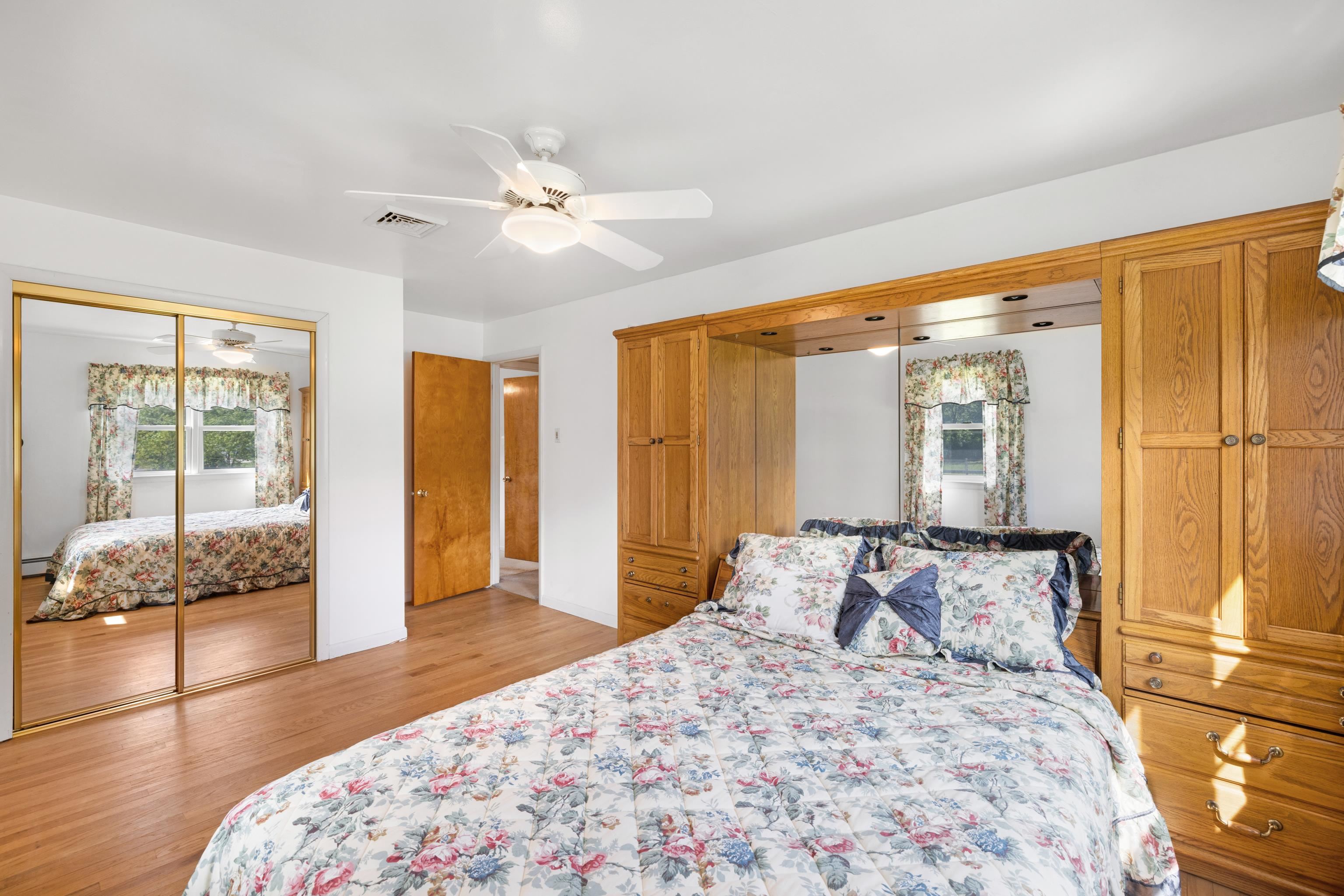 102 Teal Road Rio Grande, NJ 08242 - Photo 28 of 49 a bedroom with a large bed and a window