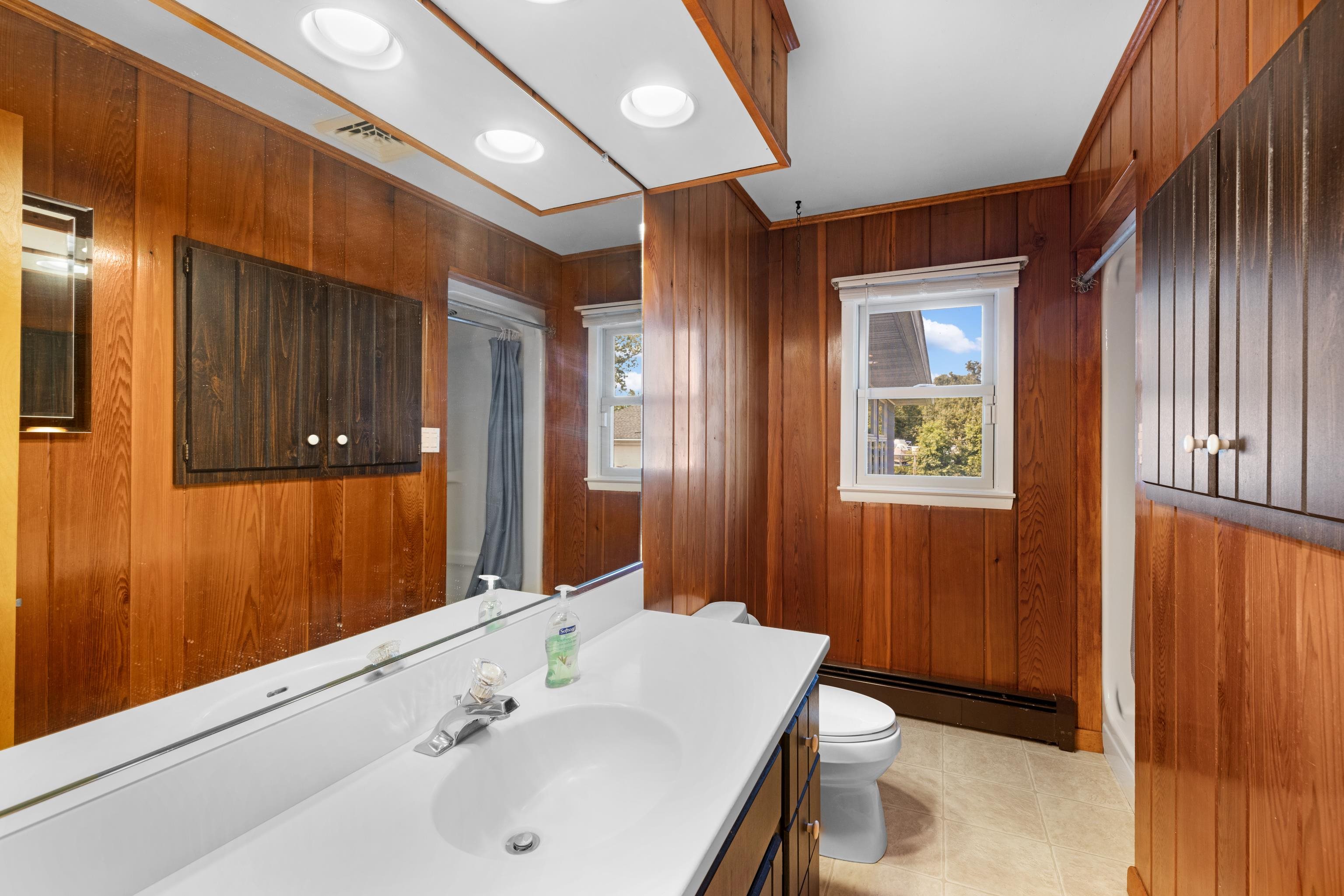 102 Teal Road Rio Grande, NJ 08242 - Photo 32 of 49 a bathroom with a sink a toilet and shower