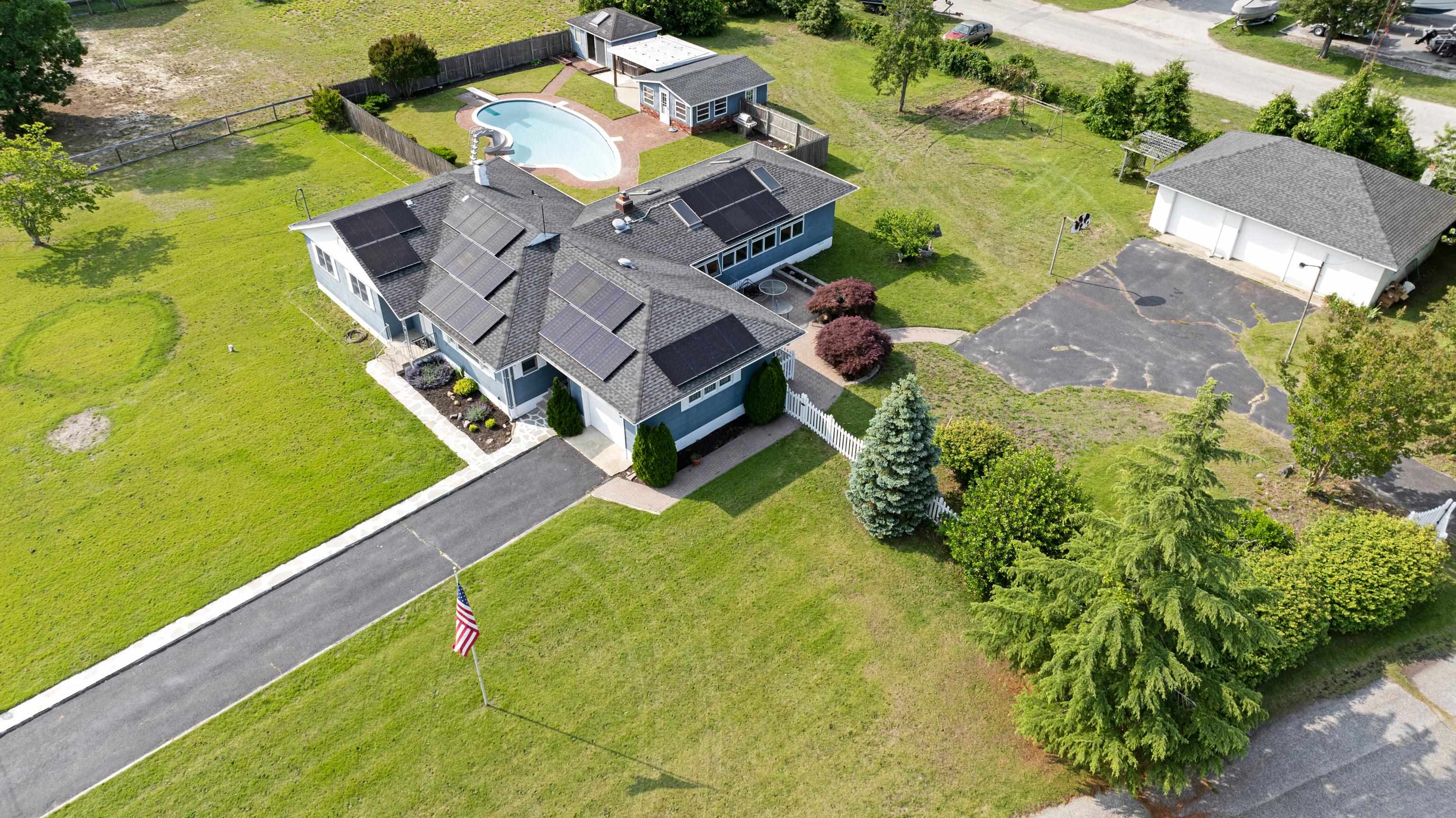102 Teal Road Rio Grande, NJ 08242 - Photo 4 of 49 an aerial view of a house with a garden