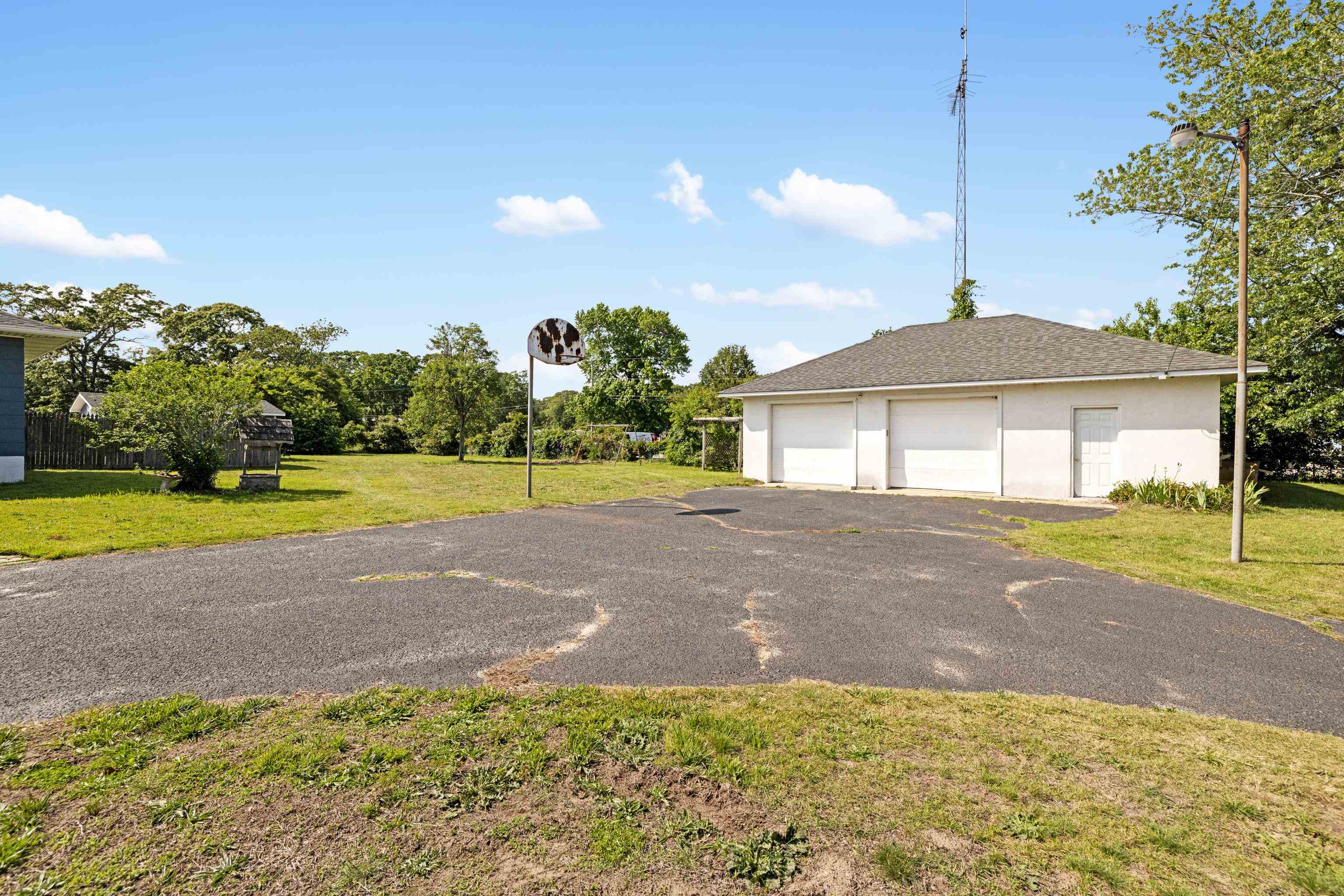 102 Teal Road Rio Grande, NJ 08242 - Photo 45 of 49 a view of a house with a yard