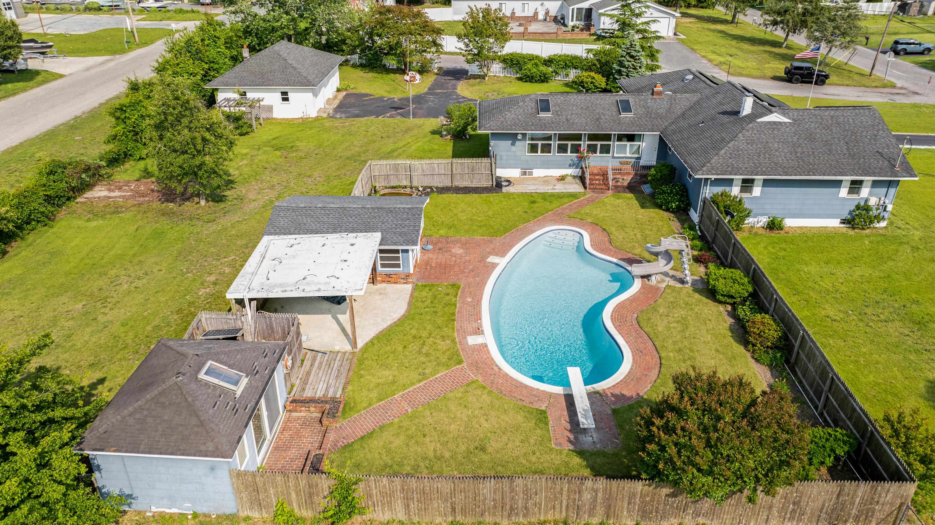 102 Teal Road Rio Grande, NJ 08242 - Photo 6 of 49 an aerial view of a house with swimming pool and outdoor space