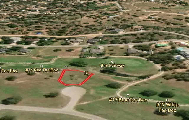 a picture of a table & chairs in a garden