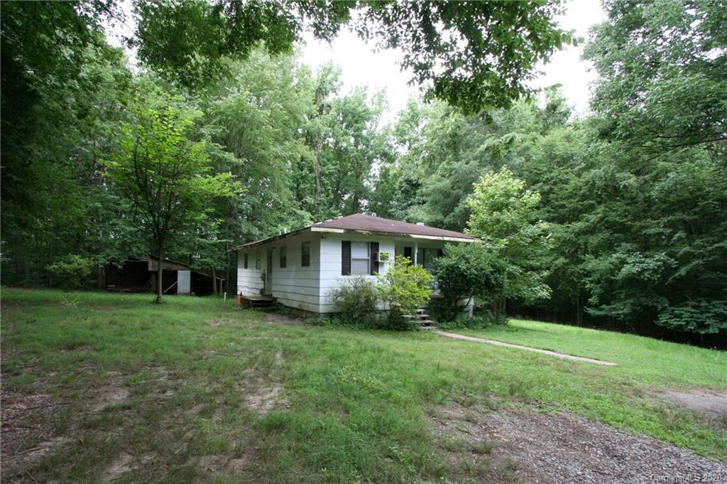 1400 Pleasant Plains Road Matthews, NC 28105 - Photo 2 of 31 a view of a house with yard and sitting area