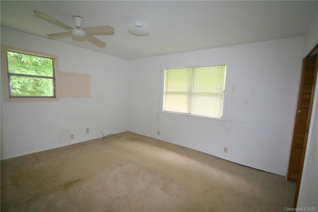 1400 Pleasant Plains Road Matthews, NC 28105 - Photo 20 of 31 an empty room with a window