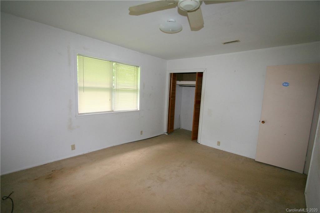 1400 Pleasant Plains Road Matthews, NC 28105 - Photo 21 of 31 a view of an empty room with a window