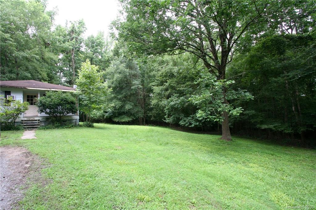 1400 Pleasant Plains Road Matthews, NC 28105 - Photo 5 of 31 a view of a backyard with a garden