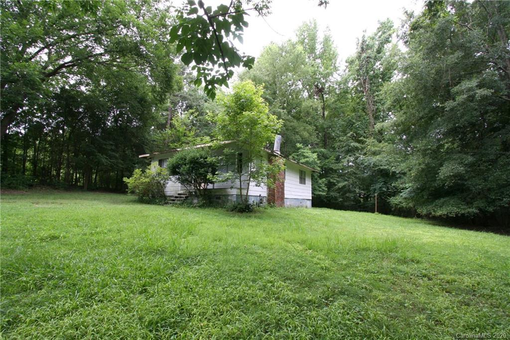 1400 Pleasant Plains Road Matthews, NC 28105 - Photo 10 of 31 a view of a trees with a yard