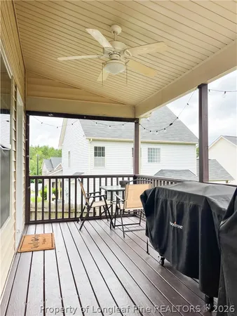a view of a balcony with furniture