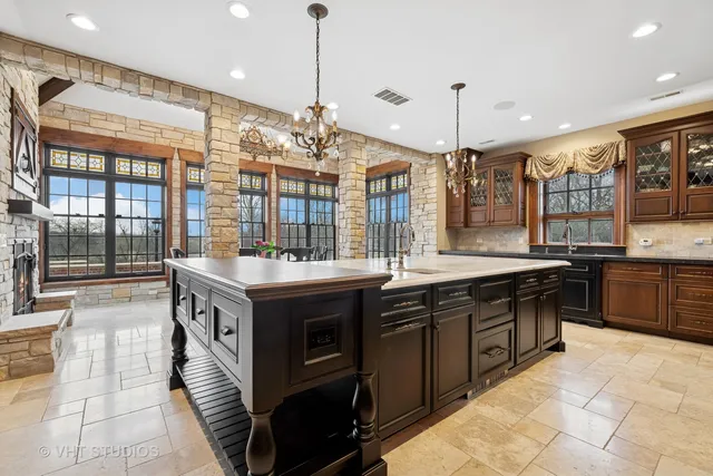 a dining room with furniture wooden floor and a rug