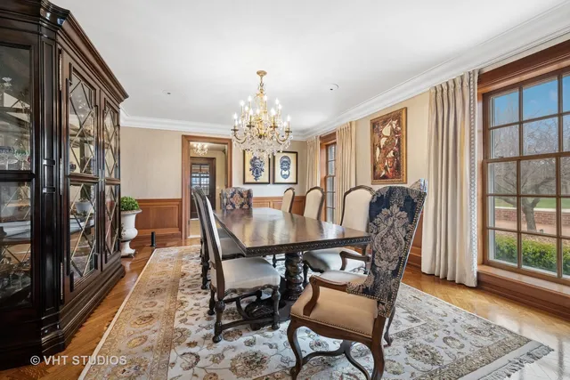 a kitchen with a table and chairs in it