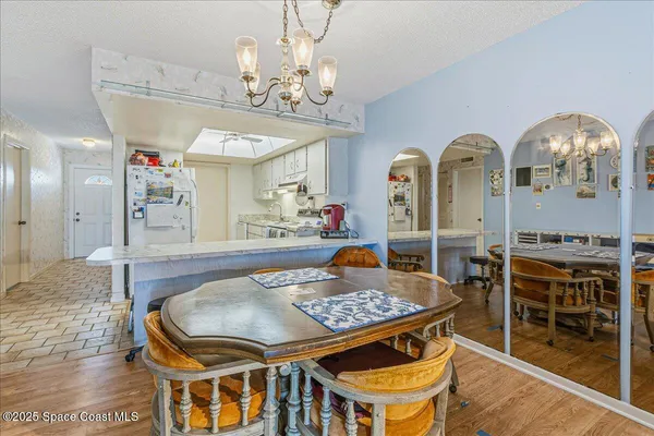 a view of a dining room with furniture