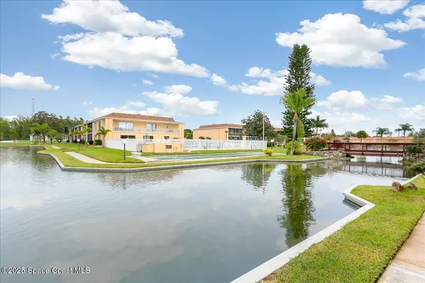 a view of a lake with a house