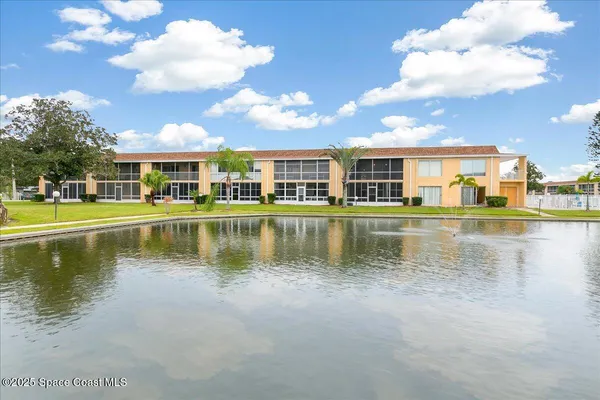 a view of a lake with houses
