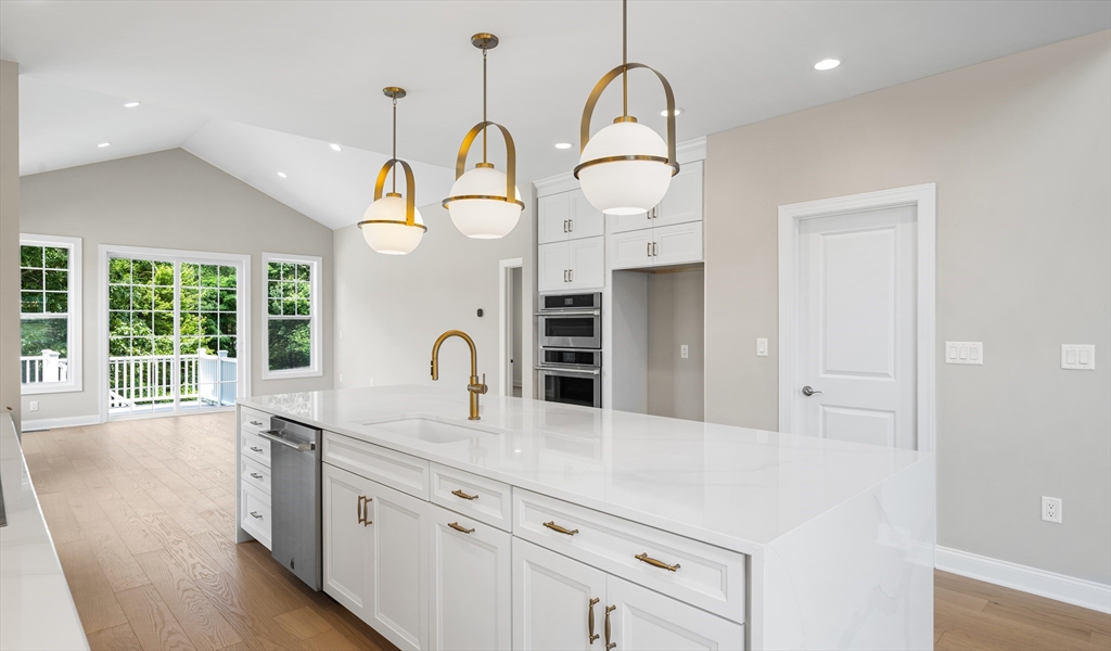 35 Ingalls Vlg Way, Unit 60 Boxford, MA 01921 - Photo 2 of 3 a kitchen with cabinets a sink and appliances