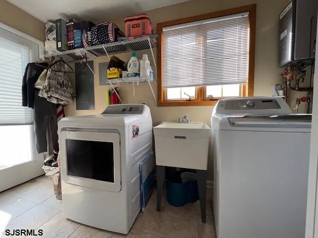 a utility room with dryer and washer