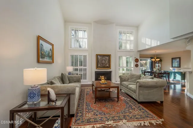 a living room with furniture or couch and a fireplace