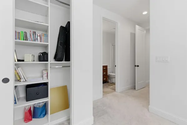 a utility room with cabinets