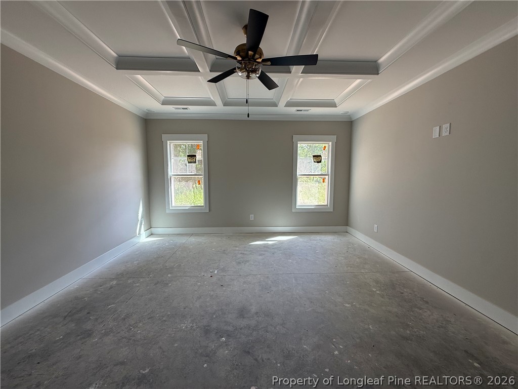 132 Ridge Stone Drive Autryville, NC 28318 - Photo 16 of 26 a view of a livingroom with a ceiling fan and window