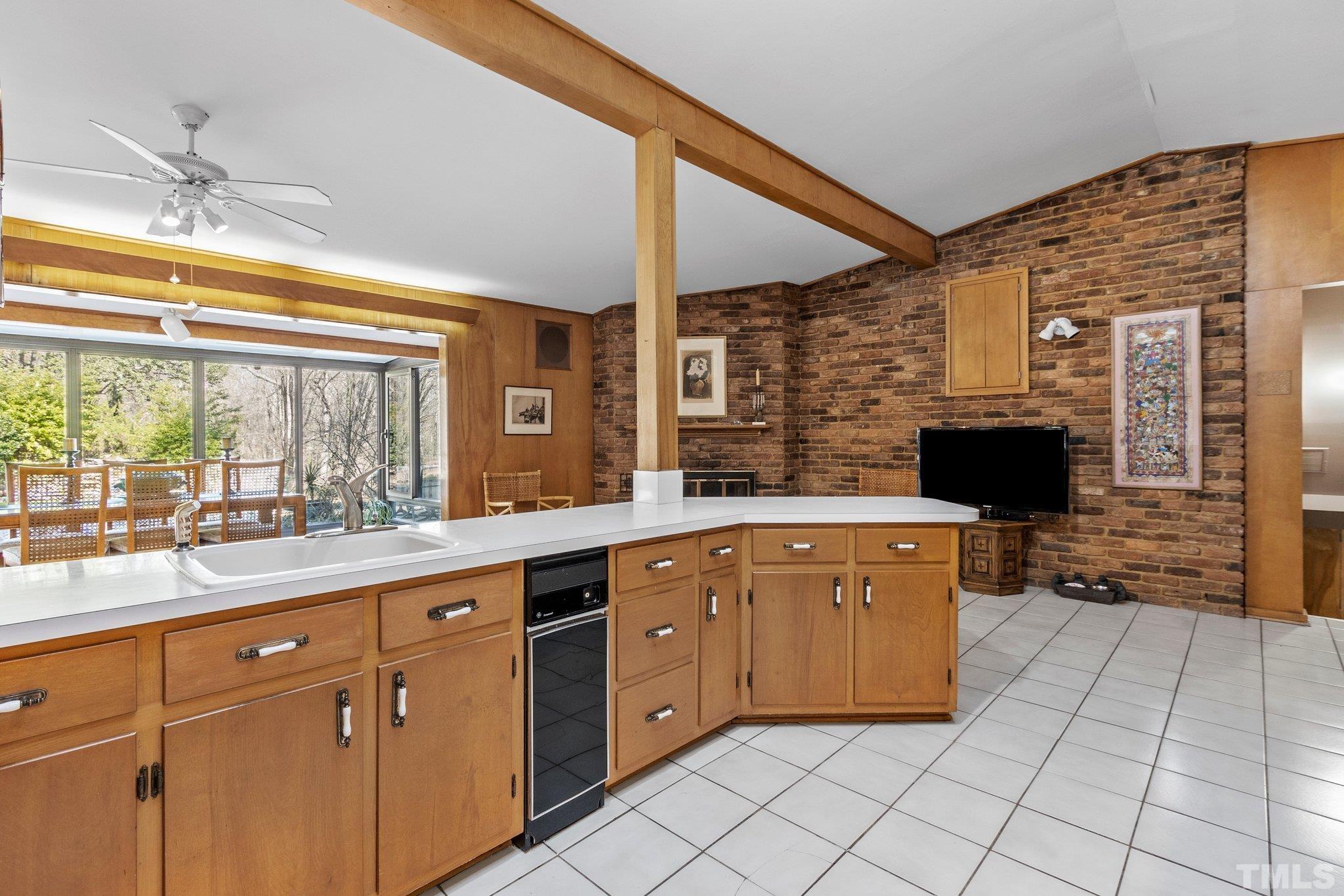 3310 Devon Road Durham, NC 27707 - Photo 20 of 50 Kitchen is open to the keeping area with fireplace.