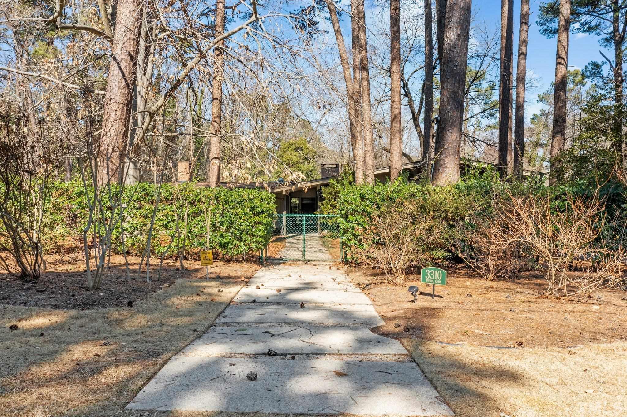 3310 Devon Road Durham, NC 27707 - Photo 2 of 50 Entrance gate allows one to pause and absorb the quiet.