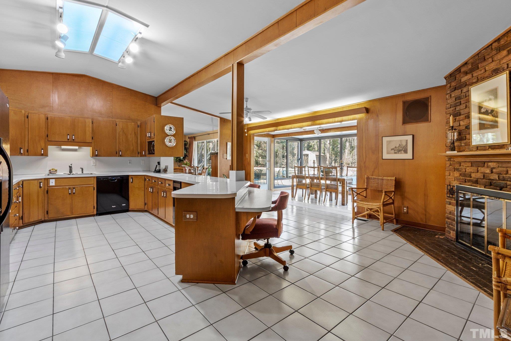 3310 Devon Road Durham, NC 27707 - Photo 21 of 50 View of cozy keeping area shows how it opens to the kitchen and into the sunny breakfast area.