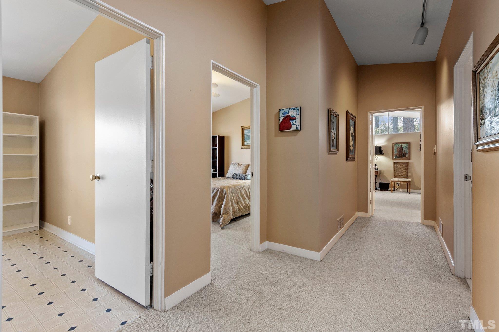 3310 Devon Road Durham, NC 27707 - Photo 39 of 50 Wide hall leading to the 4 BR is a few steps up from the Keeping Room & Kitchen.