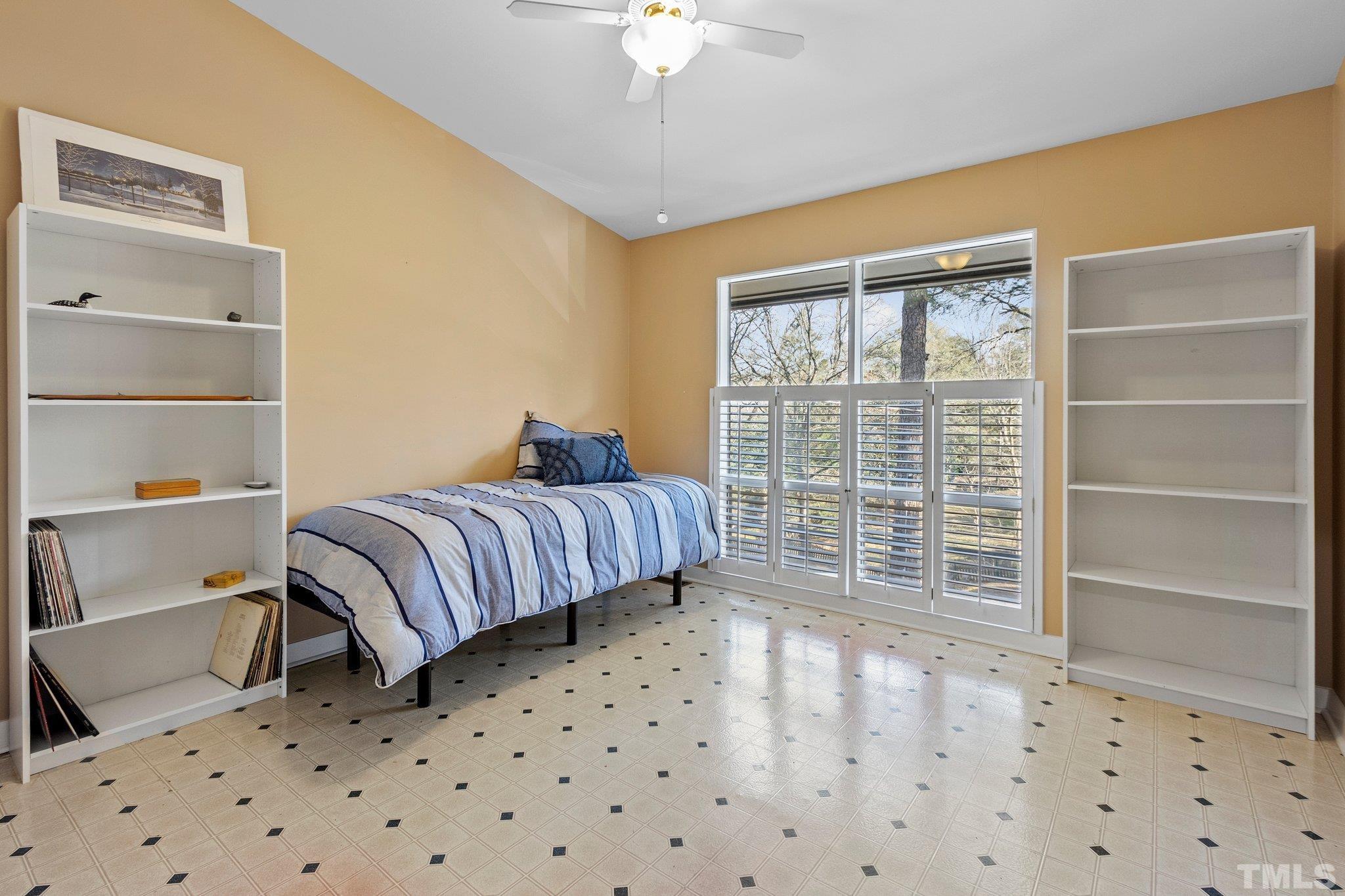 3310 Devon Road Durham, NC 27707 - Photo 42 of 50 Secondary BR can be used as a craft room with its easy clean floor and hall bath access.