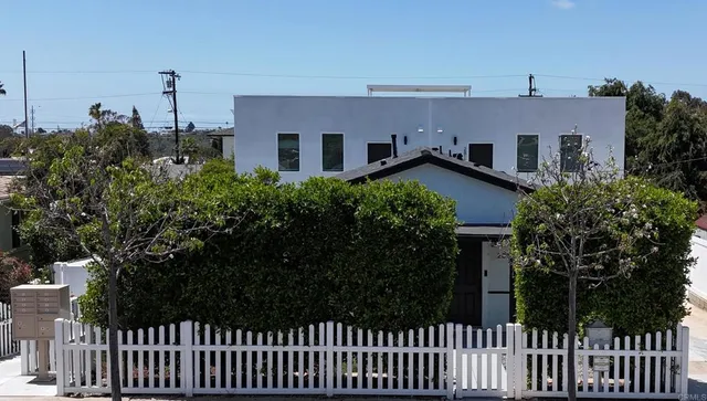 a house view with a garden space