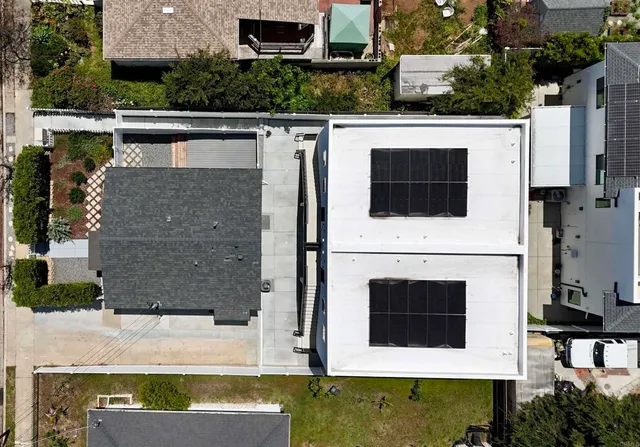 a view of front door of house with yard