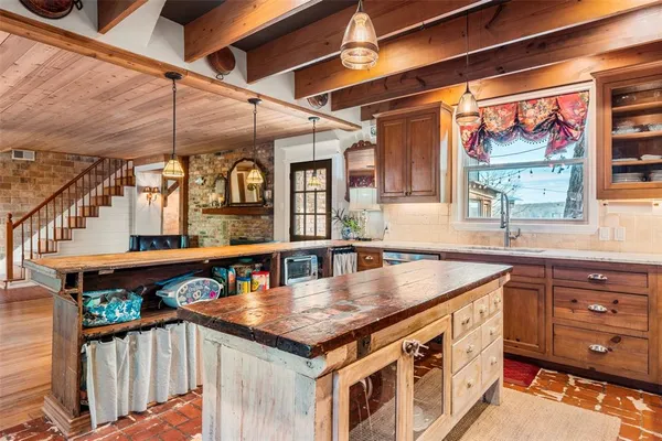 a room with a dresser and a window