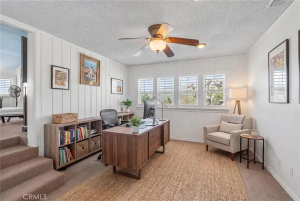 a bathroom with a sink a mirror and a toilet