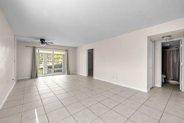 a view of an empty room and window