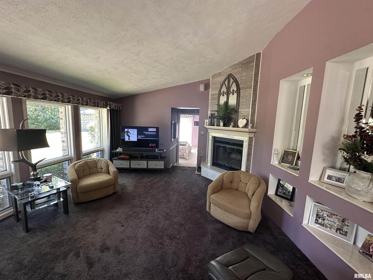 2381 Logan Street Murphysboro, IL 62966 - Photo 15 of 52 a living room with furniture and a flat screen tv