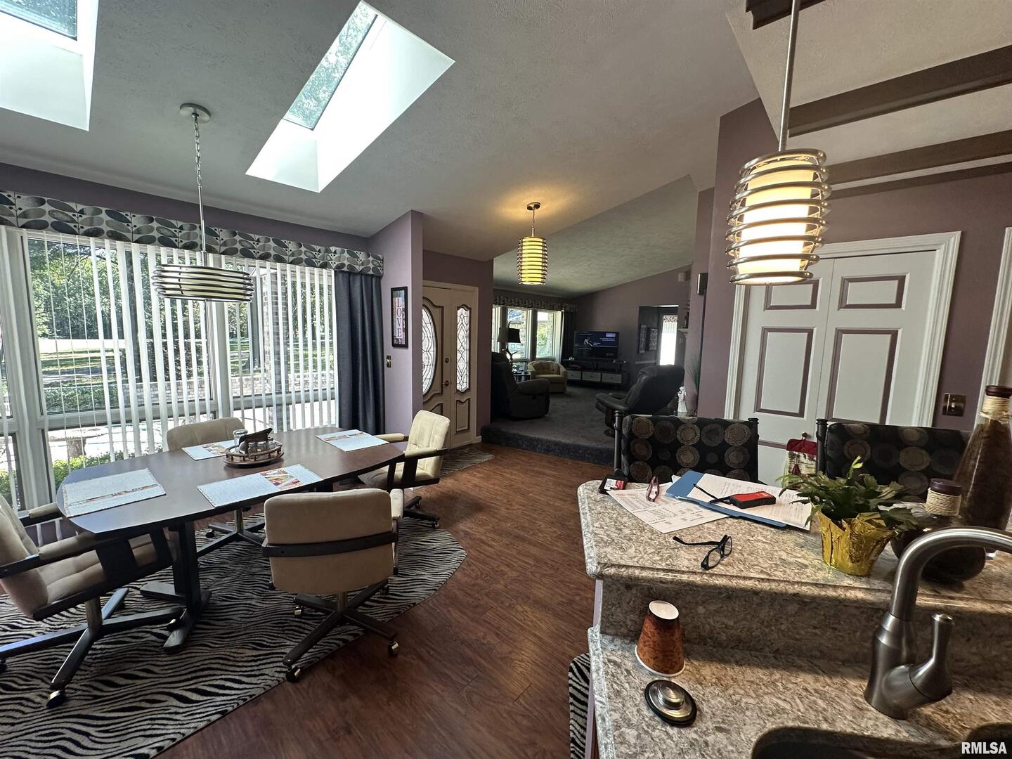 2381 Logan Street Murphysboro, IL 62966 - Photo 20 of 52 a room with musical instrument pool table chairs wooden floor and windows
