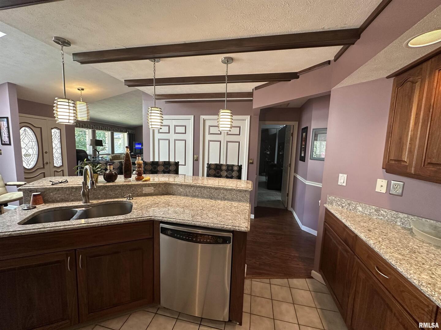 2381 Logan Street Murphysboro, IL 62966 - Photo 25 of 52 a kitchen with kitchen island granite countertop a sink and cabinets