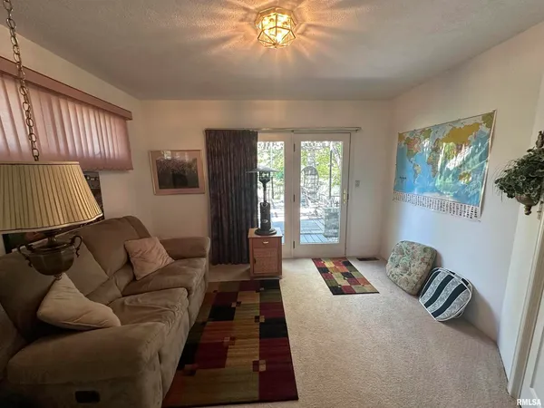a bathroom with a sink vanity mirror and a bathtub