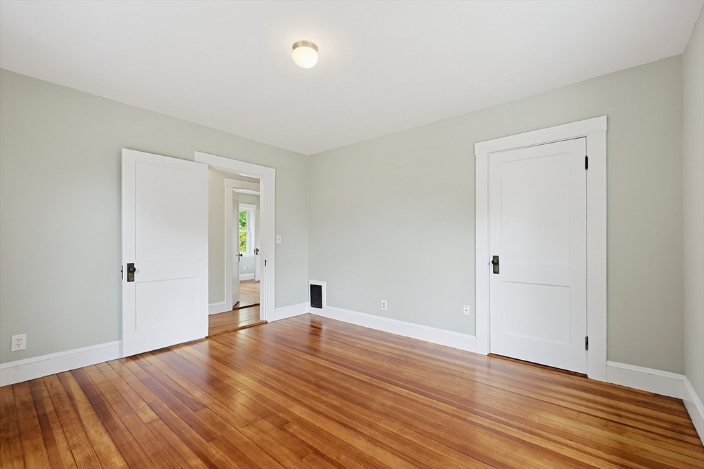 10 Water Street Natick, MA 01760 - Photo 14 of 35 a view of an empty room with wooden floor